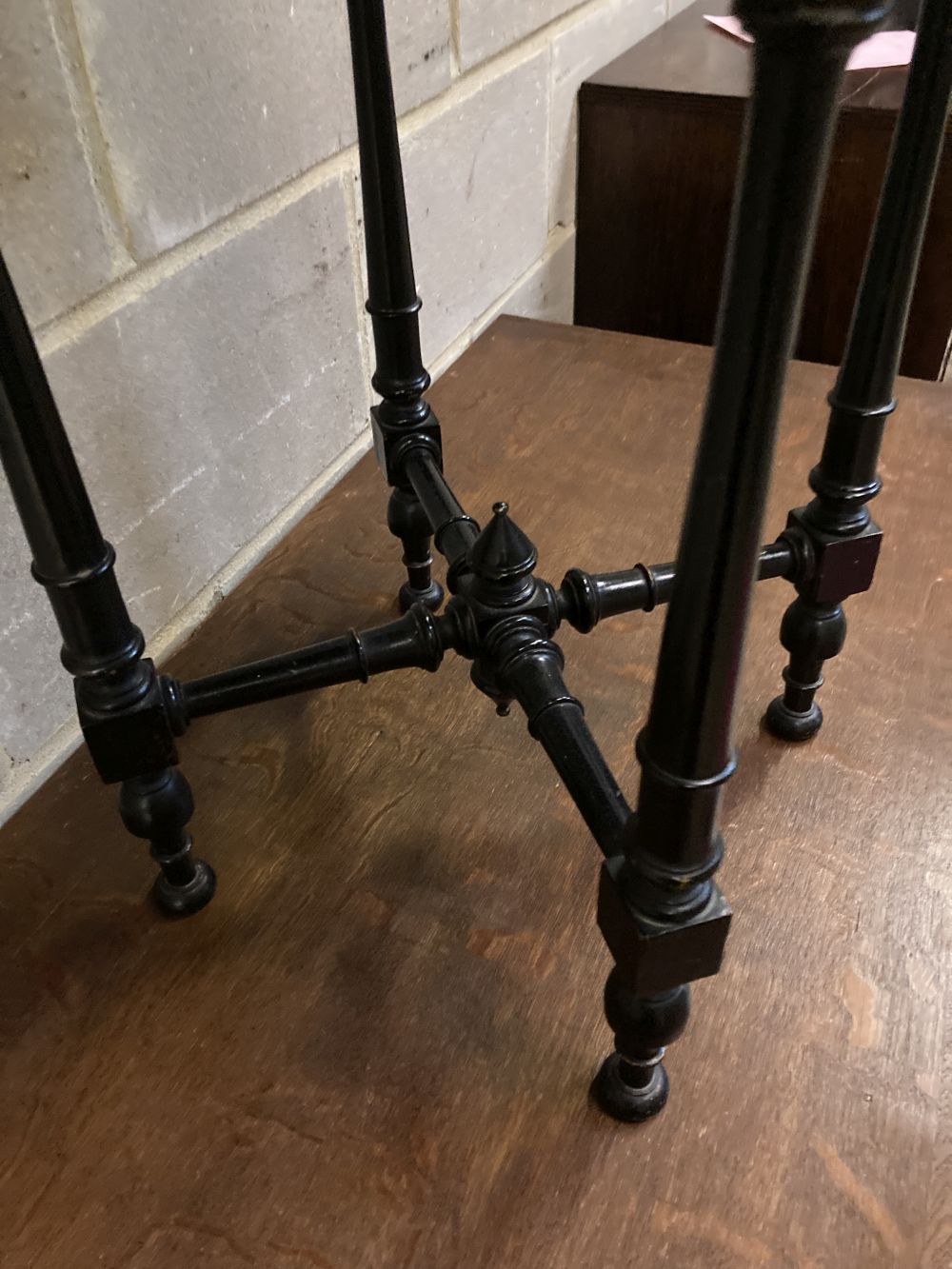 A late Victorian amboyna banded octagonal ebonised and walnut occasional table, width 49cm, depth 49cm, height 64cm